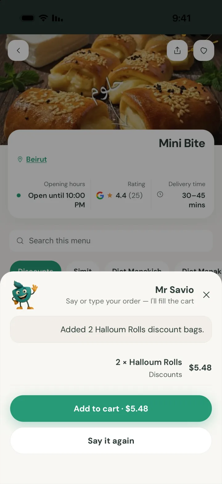 Mr Savio handing an order to the store page